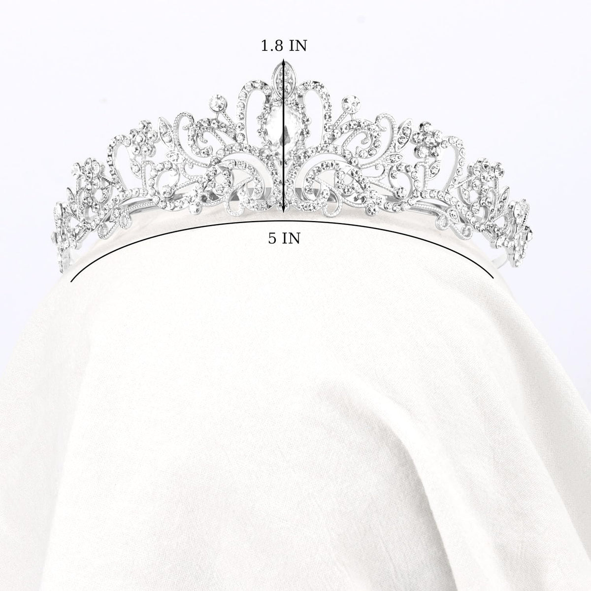 Didder tiara held in hand for scale to show compact, lightweight design