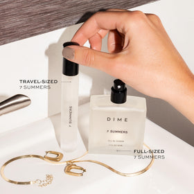 DIME 7 Summers bottle in hand to show travel-ready scale and portability