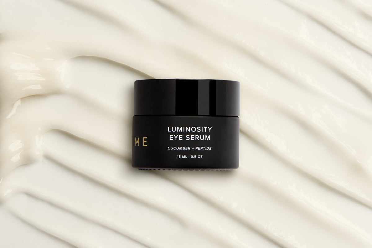 DIME applying serum in morning routine for refreshed, depuffed look