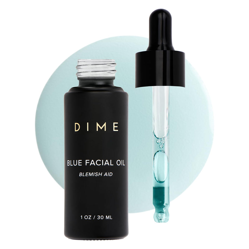 DIME blue facial oil front bottle shows elegant label and hydration benefit