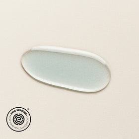 DIME blue facial oil beside ruler displaying 30 ml size and travel-friendly convenience