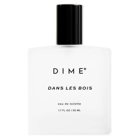DIME bottle front view showcasing elegant design and cedarwood scent