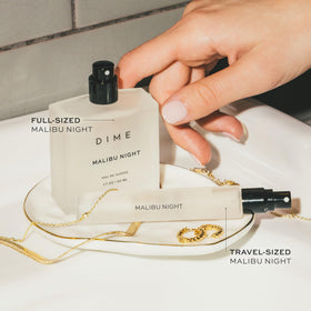 DIME label close-up highlighting fragrance name and clean-beauty promise