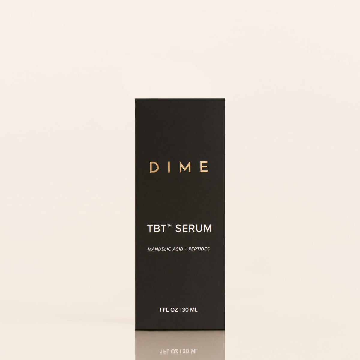 DIME TBT Serum in hand showing 1 oz size and travel-friendly