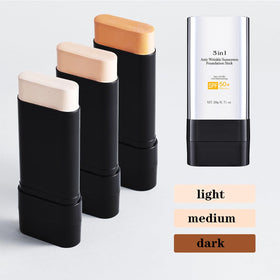 DIMOT applying stick to face for targeted coverage and sun protection