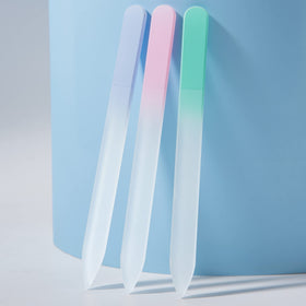 Diodiva file in hand to show size and scale for portable nail care
