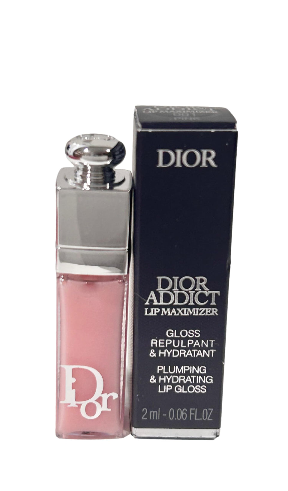 Dior Addict mini front tube showing pink gloss and branding, compact for travel