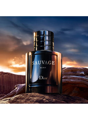 Dior Sauvage Elixir bottle beside ruler showing 3.4 oz scale and travel planning benefit