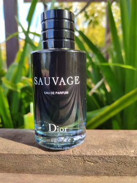 Dior Sauvage bottle styled on a shelf to suggest sophisticated everyday wear