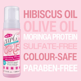 Dippity Do ingredients label highlighting hibiscus and olive oil benefits