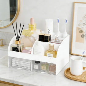 DIRZHX top view showing six partitions and arrangement options for skincare and tools