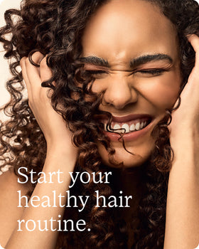 Divi shampoo staged in bathroom lifestyle setting suggesting daily routine