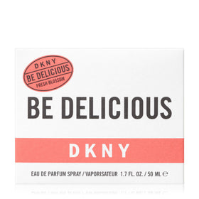 DKNY lifestyle image of wrist application showing convenient travel-ready benefit