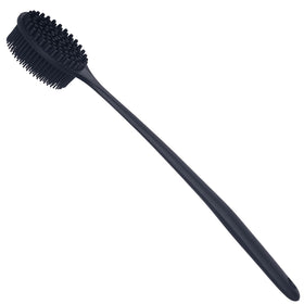 DNC scrubber creating lather under shower to demonstrate effective soap distribution