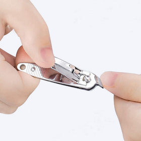 DNHCLL clipping a fingernail demonstrating accurate, safe trimming