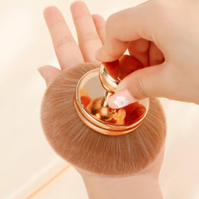 docolor blending body makeup on arm for streak-free finish