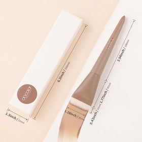 docolor brush next to cream product illustrating minimal absorption and product savings