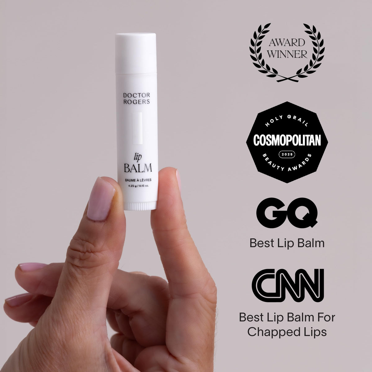 Doctor Rogers lip balm beside a coin showing compact travel-friendly size