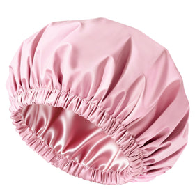 Doitory pink shower cap front view showing waterproof shell and satin benefit