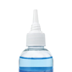 Dolahair bottle on a bathroom counter for convenient at-home removal