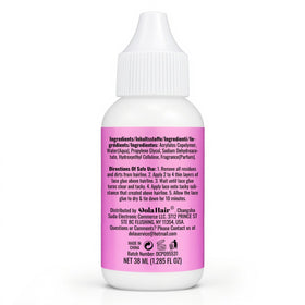 Dolahair scale comparison with a ruler showing compact 100ml spray bottle size