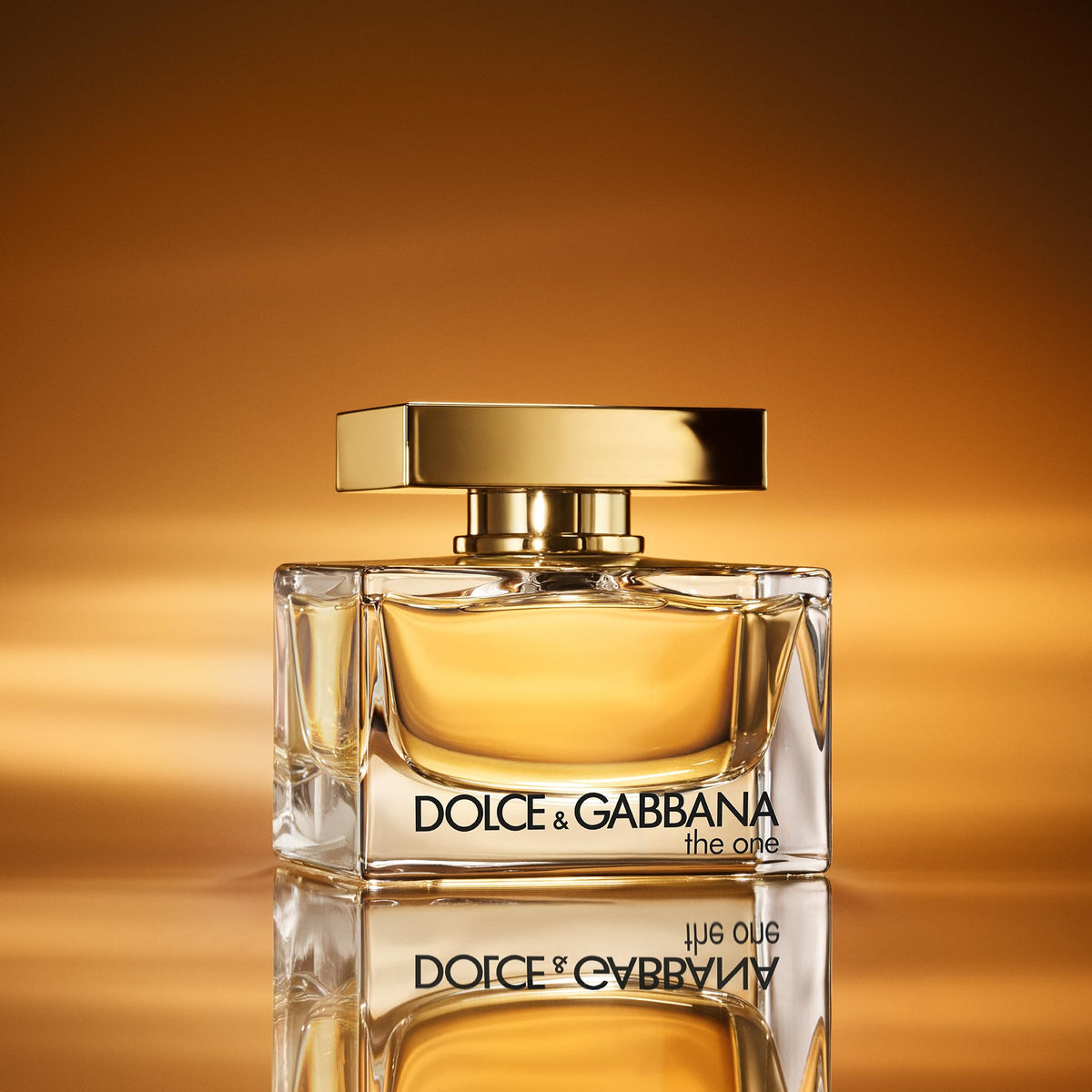 Dolce&Gabbana The One mist sprayed from bottle demonstrating easy application