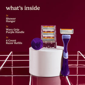 Dollar Shave Club purple wavy handle close-up for secure wet grip benefit