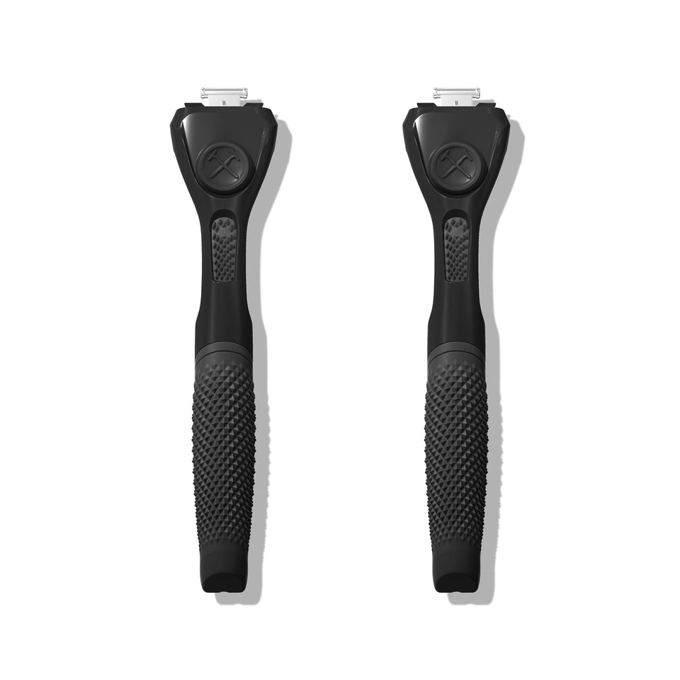 Dollar Shave Club black handle front view showing sleek finish and control