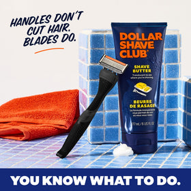 Dollar Shave Club handle on bathroom counter suggesting travel readiness