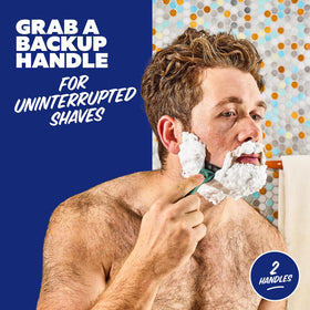 Dollar Shave Club handle attached to 4-blade cartridge demonstrating compatibility