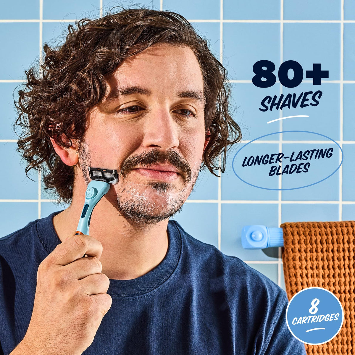 Dollar Shave Club JUICY lubricant strip detail emphasizing smoother glide and reduced friction