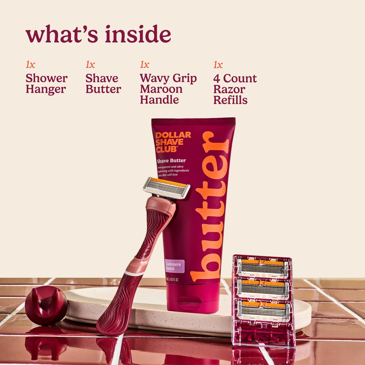 Dollar Shave Club maroon handle close-up with wavy grip for steady control