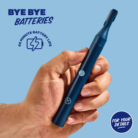 Dollar Shave Club trimmer next to a standard razor illustrating compact size