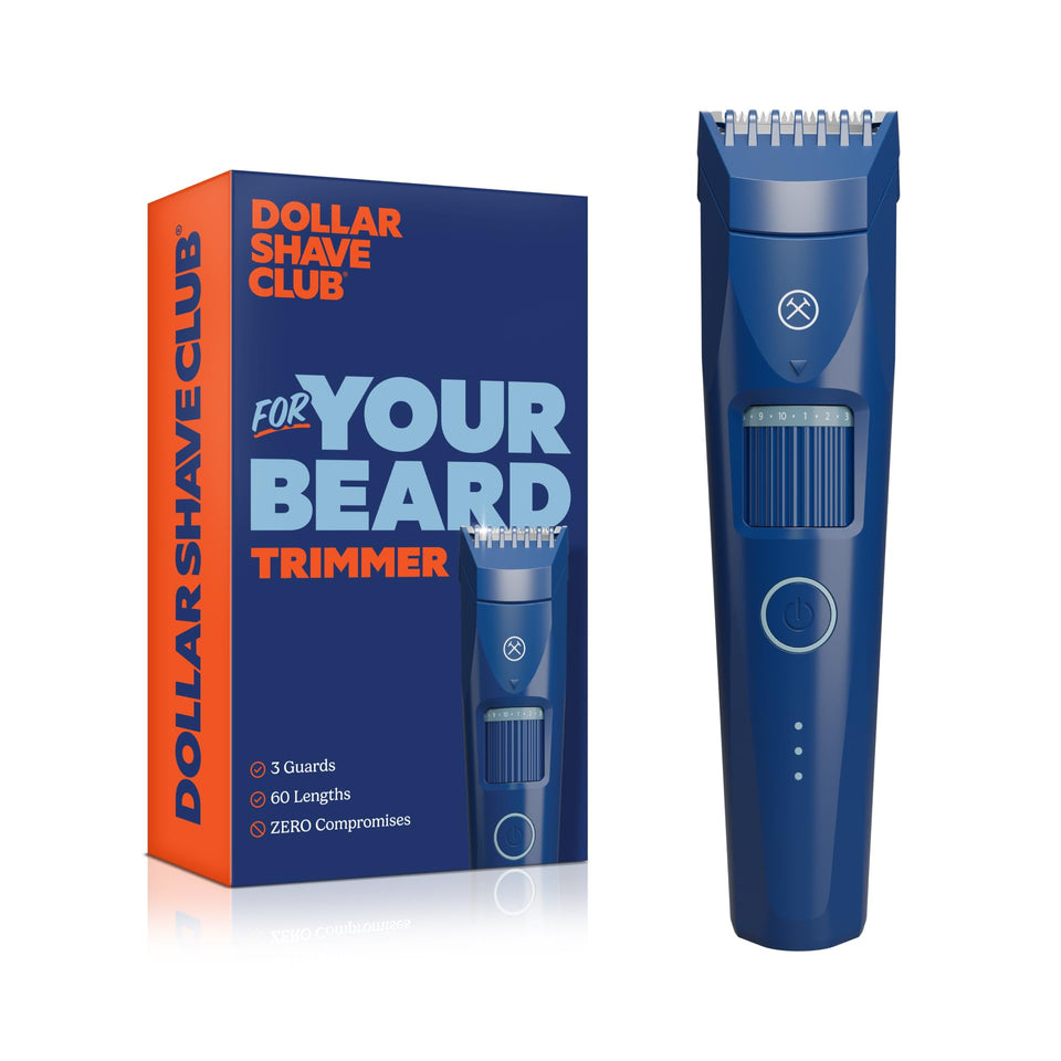 Dollar Shave Club trimmer front view showing ergonomic grip and travel-ready shape