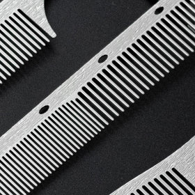 Dolmifapro dual-tooth spacing close-up showing fine and standard teeth for versatile styling