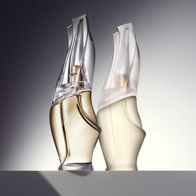 Donna Karan label close-up showing fragrance notes and benefit of clear ingredient cues