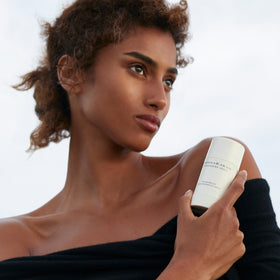 Donna Karan Cashmere Mist stick close-up texture illustrating non-greasy finish