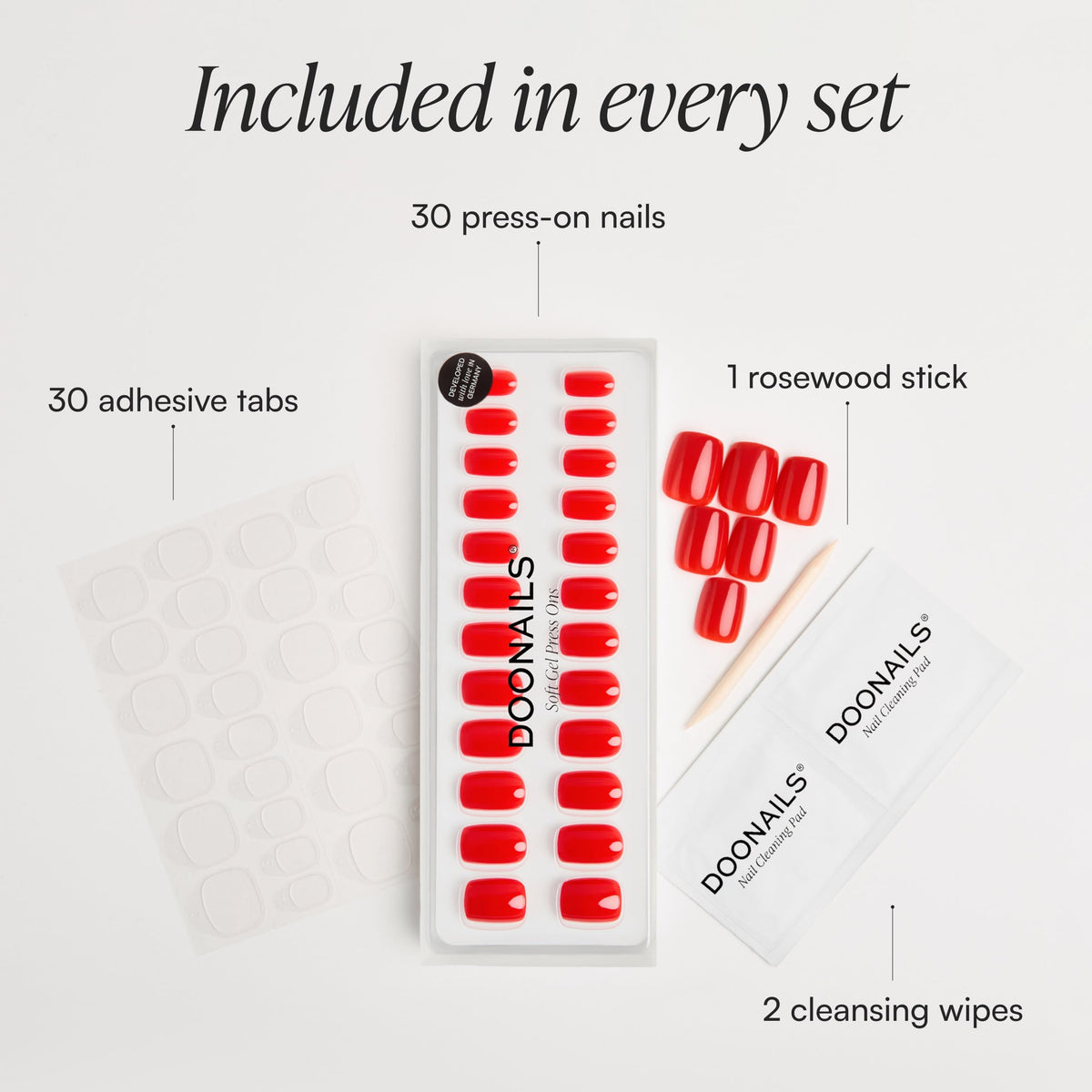DOONAILS adhesive stickers and wipes organized to show secure, clean application benefit