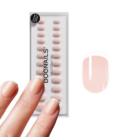 DOONAILS front packaging showing white French tips and kit contents for easy salon results