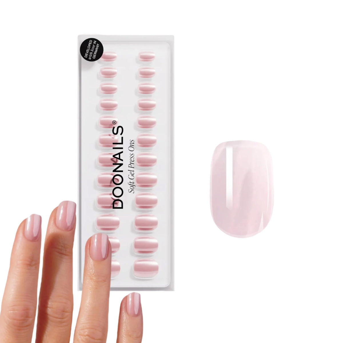 DOONAILS front packaging showing kit contents and neat pink finish benefit