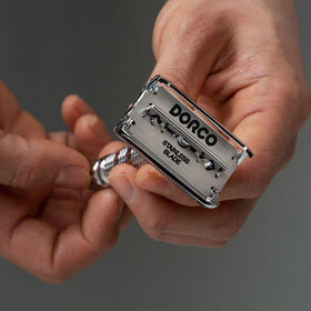 DORCO ST301 blade installed in safety razor demonstrating smooth shave control