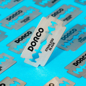 DORCO ST301 blade next to ruler for scale showing compact, travel-friendly size