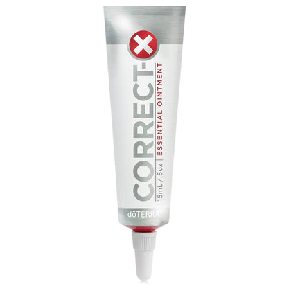 doTERRA Correct-X® tin front view showing compact ointment for targeted skin care