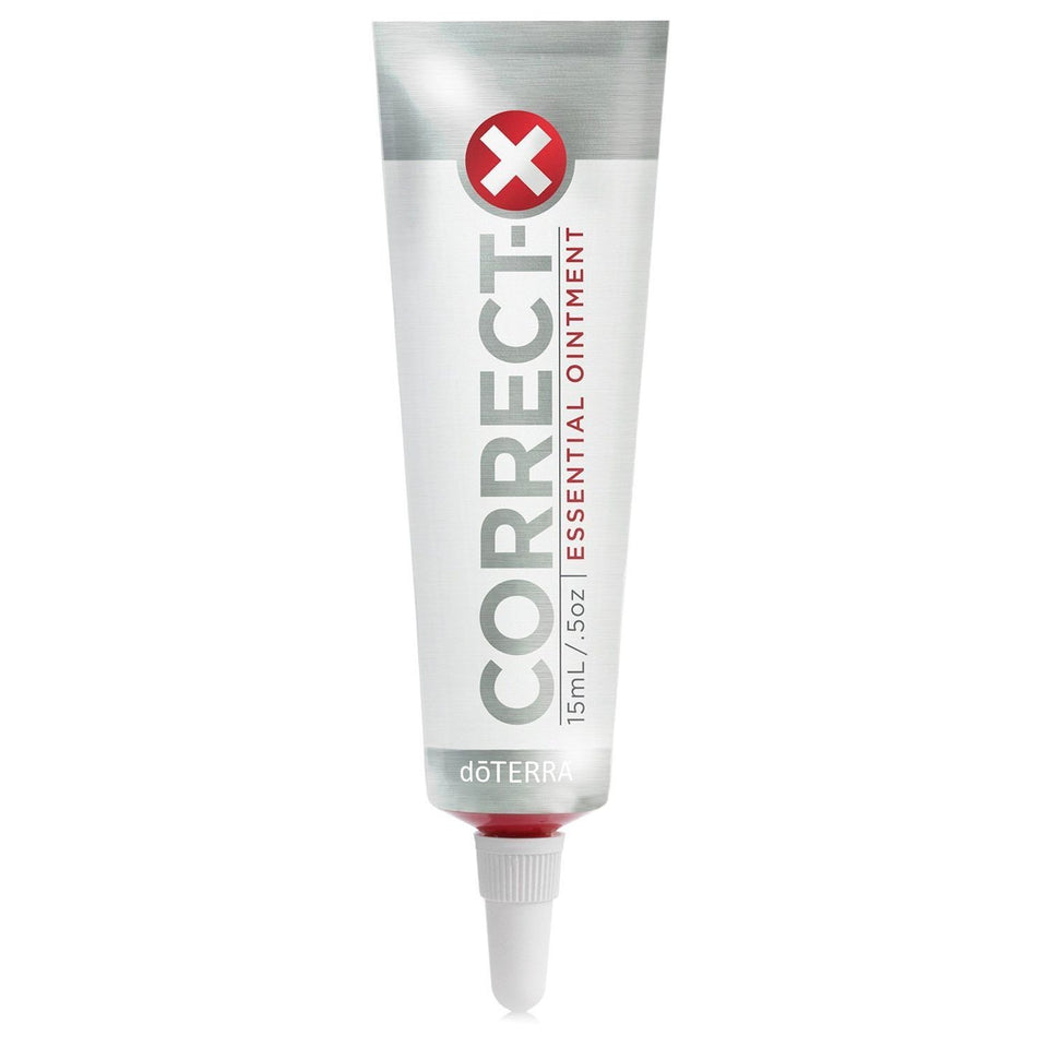 doTERRA Correct-X® tin front view showing compact ointment for targeted skin care