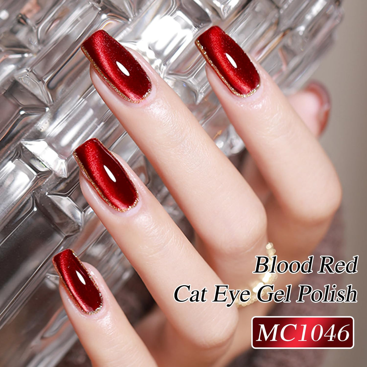 Double Rhythm magnet held over wet polish showing cat eye alignment and striking shimmer