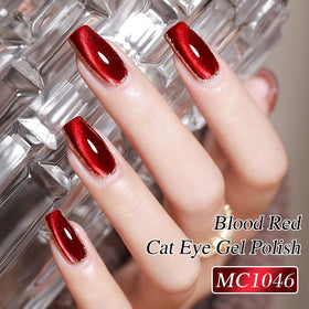 Double Rhythm magnet held over wet polish showing cat eye alignment and striking shimmer
