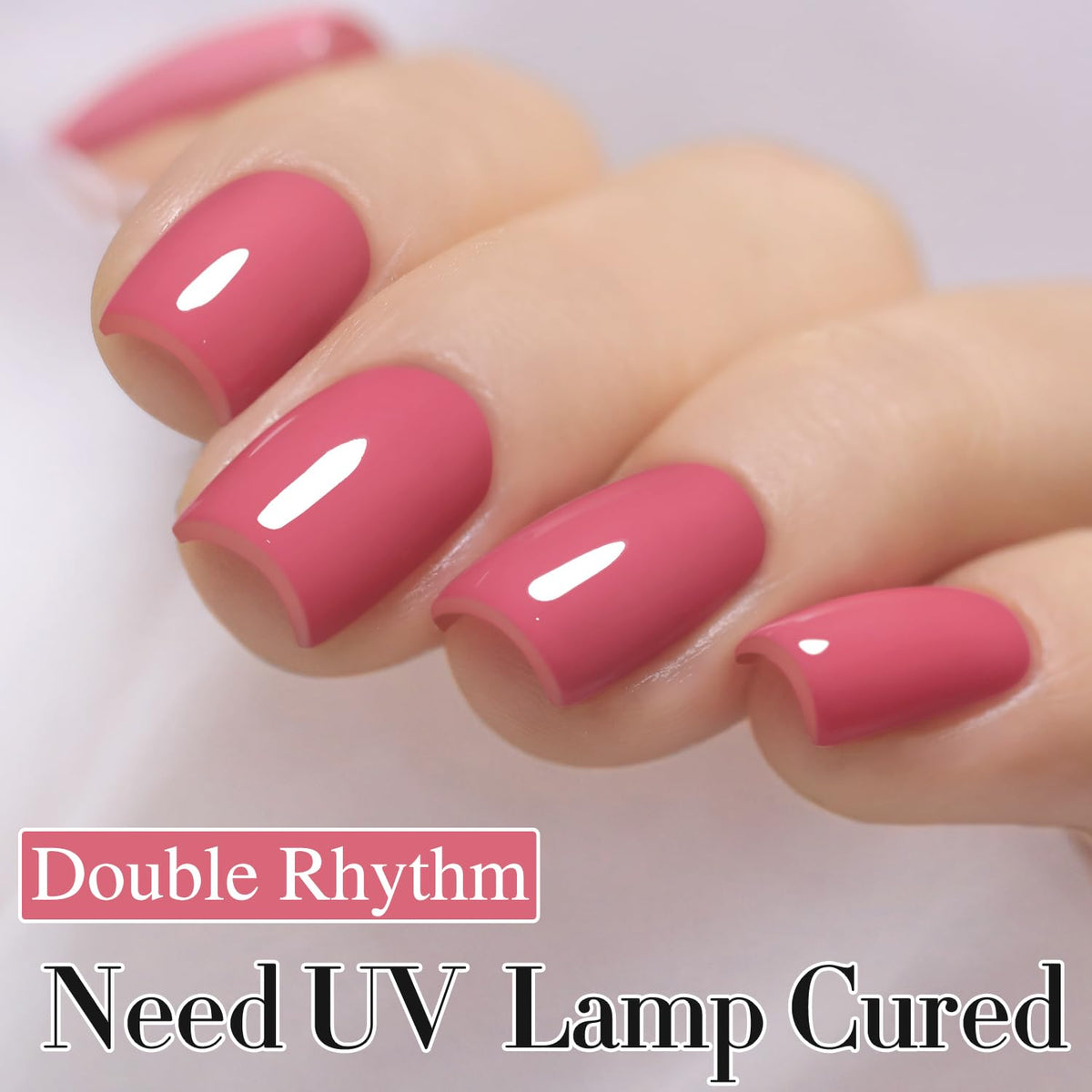 Double Rhythm brush applying a smooth stroke on a nail for even coverage benefit