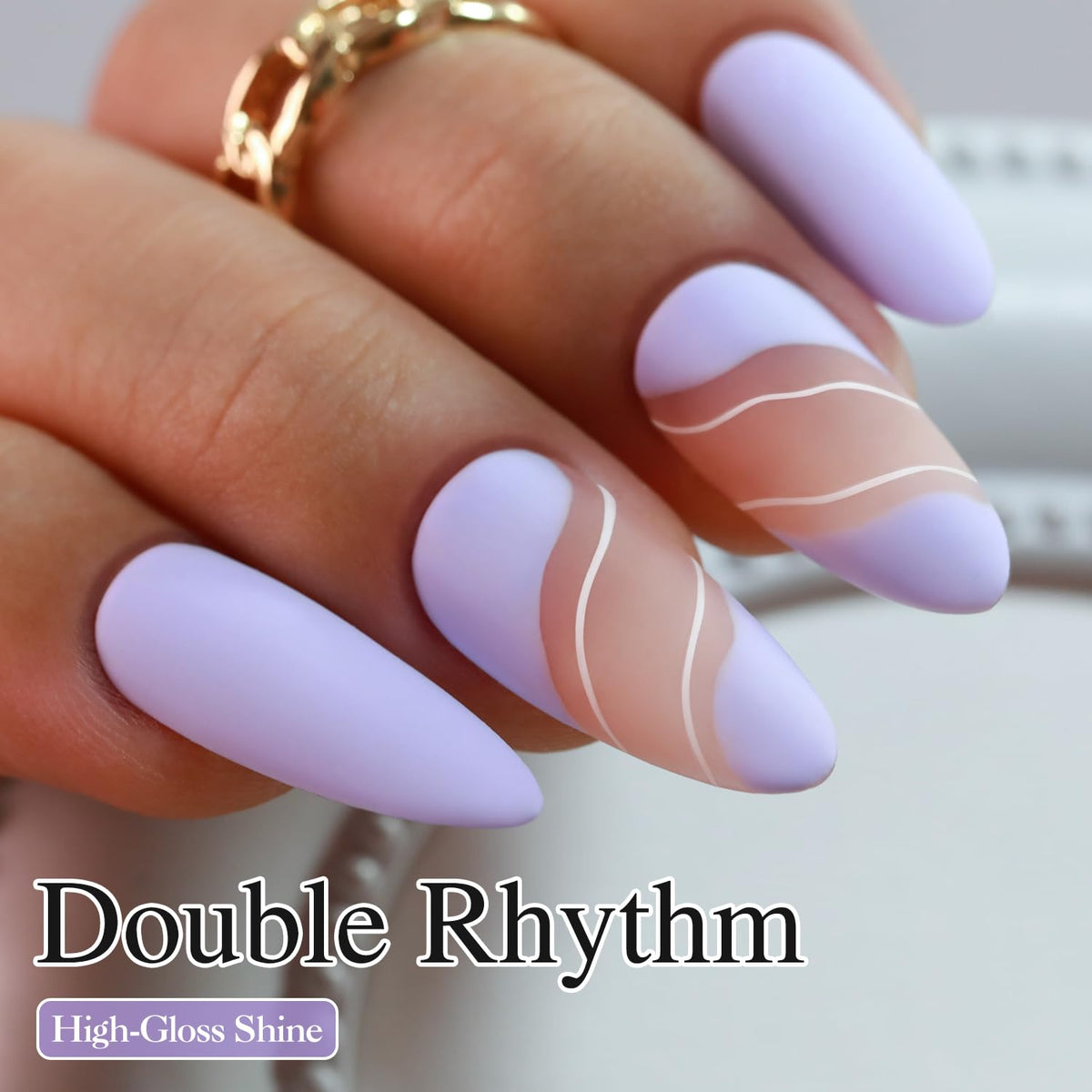 Double Rhythm cap and brush detail highlighting smooth applicator for even strokes
