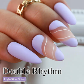 Double Rhythm cap and brush detail highlighting smooth applicator for even strokes