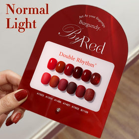 Double Rhythm color swatch fan demonstrating consistent glittery maroon shade